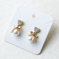 Pearl Heart Bow glow studs